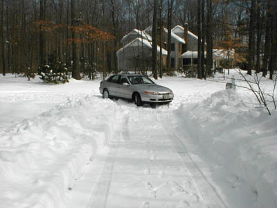 Karen tries to get the car out and fails