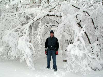 Alan under snowy trees