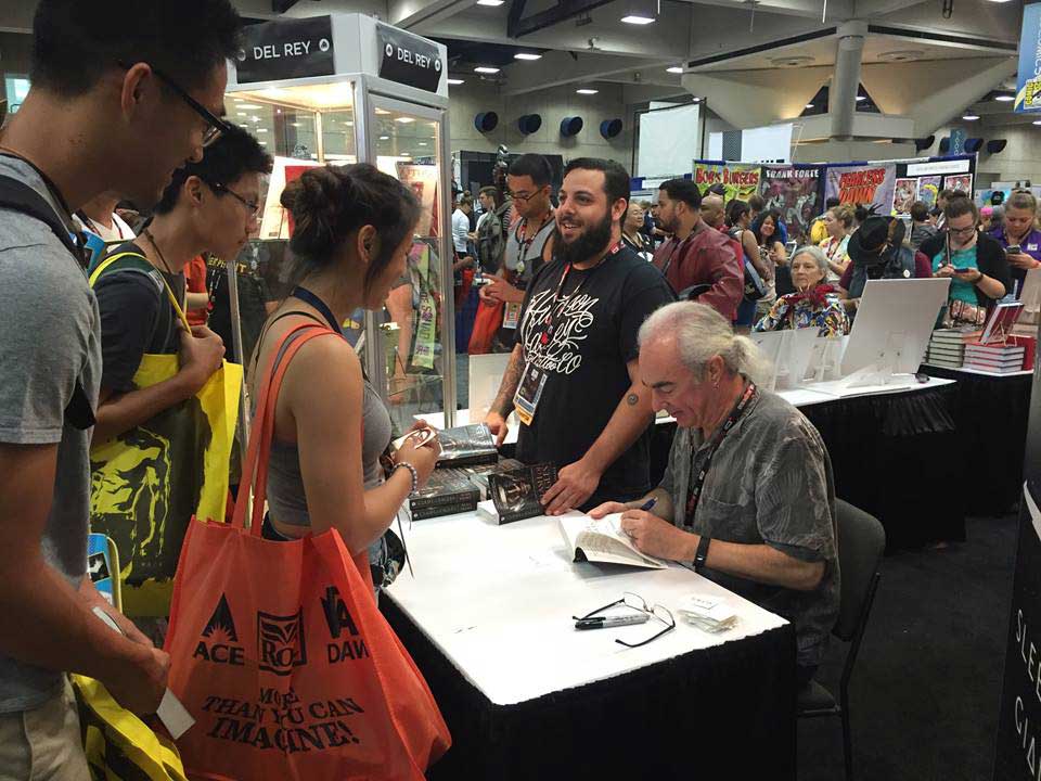 Alan signing books